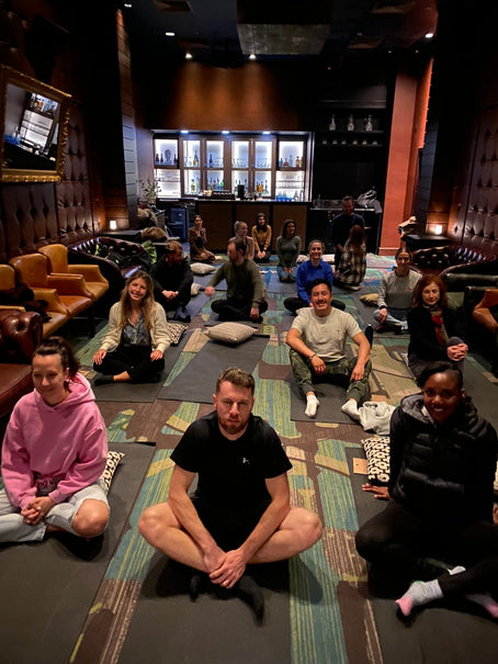 A group of people at a yoga class: London Nootropics hospitality