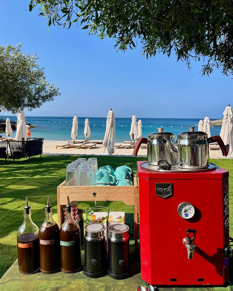 Adaptogenic coffee being served on a beach